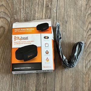 Orange Theroy fitness monitor and two bands